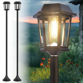 DOESLAG two-pack solar lamp post lights, 61 inches tall, for curb appeal at night.