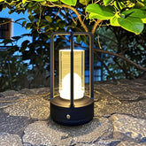 DOLAFY portable metal table lamp, side view, ideal for outdoor charging scenarios.