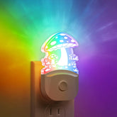 DORESshop mushroom night light 2-pack plugged into wall provides cozy ambient glow for kids and adults.