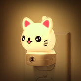DORESshop Cat Night Light plugged into wall emits soft, kid-friendly glow