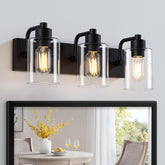 Dpyrrhic matte black 3-light vanity fixture over mirror with warm, modern illumination