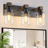 DvmTeom farmhouse wood vanity light with three bulbs above the mirror for warm ambiance.