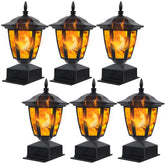 Dynaming solar flame post light on a 4x4 cap adds warm ambiance to a fence