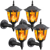 Dynaming solar flame wall lanterns four-pack casting flickering warm glow for outdoor décor