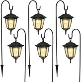 Dynaming solar hanging lantern delivering warm outdoor illumination for gardens.