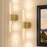 Eclipterra battery wall sconce with crystal frame adds elegant glow to bedroom