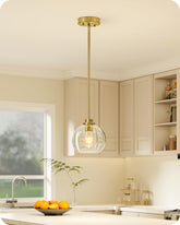 EDISHINE pendant light globe shade glows softly over kitchen island for ambient illumination