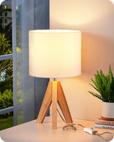 EDISHINE small cute table lamp with wooden tripod base provides stable bedside lighting.