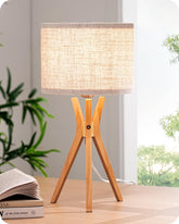 EDISHINE tripod table lamp base in natural wood adds warmth to bedrooms.