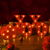 EDYCON XOXO letters tabletop display with warm glow for Valentine mood.