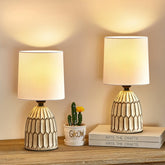 EJIAXIN hand-painted ceramic table lamp base adds rustic charm to a surface.