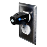 Elink EMF Neutralizer plugged into wall outlet showing compact design