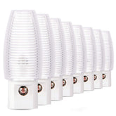 Emotionlite 8-pack plug-in night light illuminating a hallway for nighttime safety.
