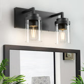 Espird two-light vanity light in matte black with clear glass shades.