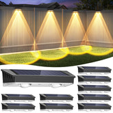 Etetale solar fence light illuminating a cozy backyard ambiance at dusk