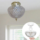 Evelots clip-on shade with antique diamond-cut acrylic dome enhances vintage ambiance.