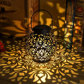 EXCMARK 2-pack outdoor solar hanging lanterns illuminate patios with metal LED glow.