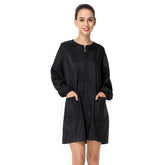 Exttlliy salon smock front view shows sleek black professional look.
