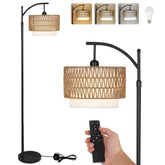 Eyassi Arc floor lamp in living room with remote for ambient lighting