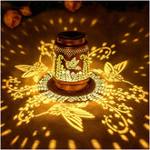 EZTZEN hummingbird solar lantern hanging in garden with warm LED glow.