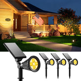 FALOVE solar spotlights illuminate the garden path with inviting warm beams.