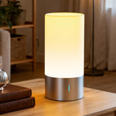 Famigreta table lamp with dimmable warm white light for relaxed evenings