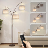 Fansdrick 3-Light Arc Floor Lamp, front view highlights brightness and beige shade for cozy living room ambiance.