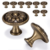 Fecraf antique brass knob on a dresser front adds timeless style