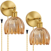 Femusytt plug-in wall sconce with amber tulip shade adds warm vintage glow to any room.