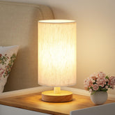 Fenmzee small table lamp with cream shade for cozy bedside lighting.