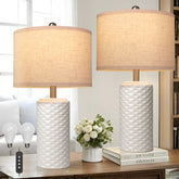 FINCMY 23-inch bedside lamp set on a nightstand enhances bedroom decor.