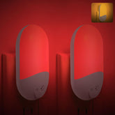 Finezeal 670nm red and amber night light glows softly in a nursery.
