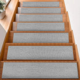 FlowaFoli stair treads 8x30 grey on wooden stairs for secure footing.