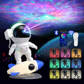 FlyEagle Astronaut rocket base projecting vivid galaxy for wall decor.