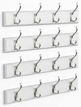 Forbena white coat rack with four silver hooks, ideal for entryway organization.