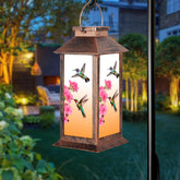 Fussion hummingbird lantern close-up shows delicate silhouette and warm glow