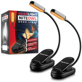 GearLight rechargeable book light clipped onto a book for hands-free reading at night.