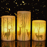 GenSwin flameless 4in pillar candle with deer decal glowing warmly for holidays.