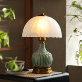 Glivpny vintage lamp with green base adds timeless style to your living room.