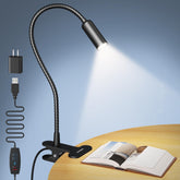 Glocusent clip-on light mounted on headboard for focused nighttime reading.