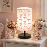 Glooglitter pink bow table lamp adds playful charm to a bedside or desk
