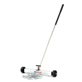 GreatMag rolling magnetic sweeper with 17-inch head lifting nails on concrete.