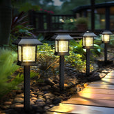Greluna solar lights with Edison-style bulb add classic curb appeal to pathways.