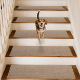 GROWLING beige linen stair treads on wooden stairs for stable footing.