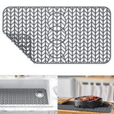 GUUKIN grey grid silicone sink mat protecting sink bottom and aiding drainage.