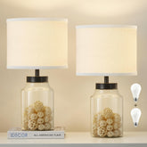 GyroVu fillable table lamp with clear glass body for personalized decor.