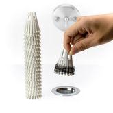 HairClaw disposable haircatcher 20-pack traps hair in the tub, keeping drains clear.