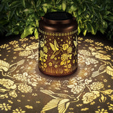 HEGUD solar lantern featuring hummingbird rose design for warm garden lighting