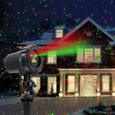 HERHOTER Christmas laser lights outdoors illuminate walls with vivid red and green beams for festive decor.