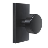 Hiemey matte black knob close-up showcases modern square design for hallways and closets, durable daily use.